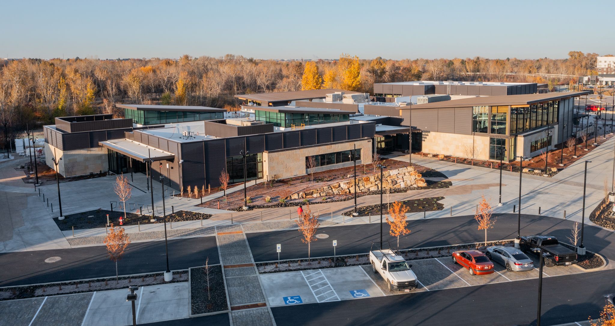 An exterior view of the Idaho Outdoor Fieldhouse campus with accessible entrances and walkways.