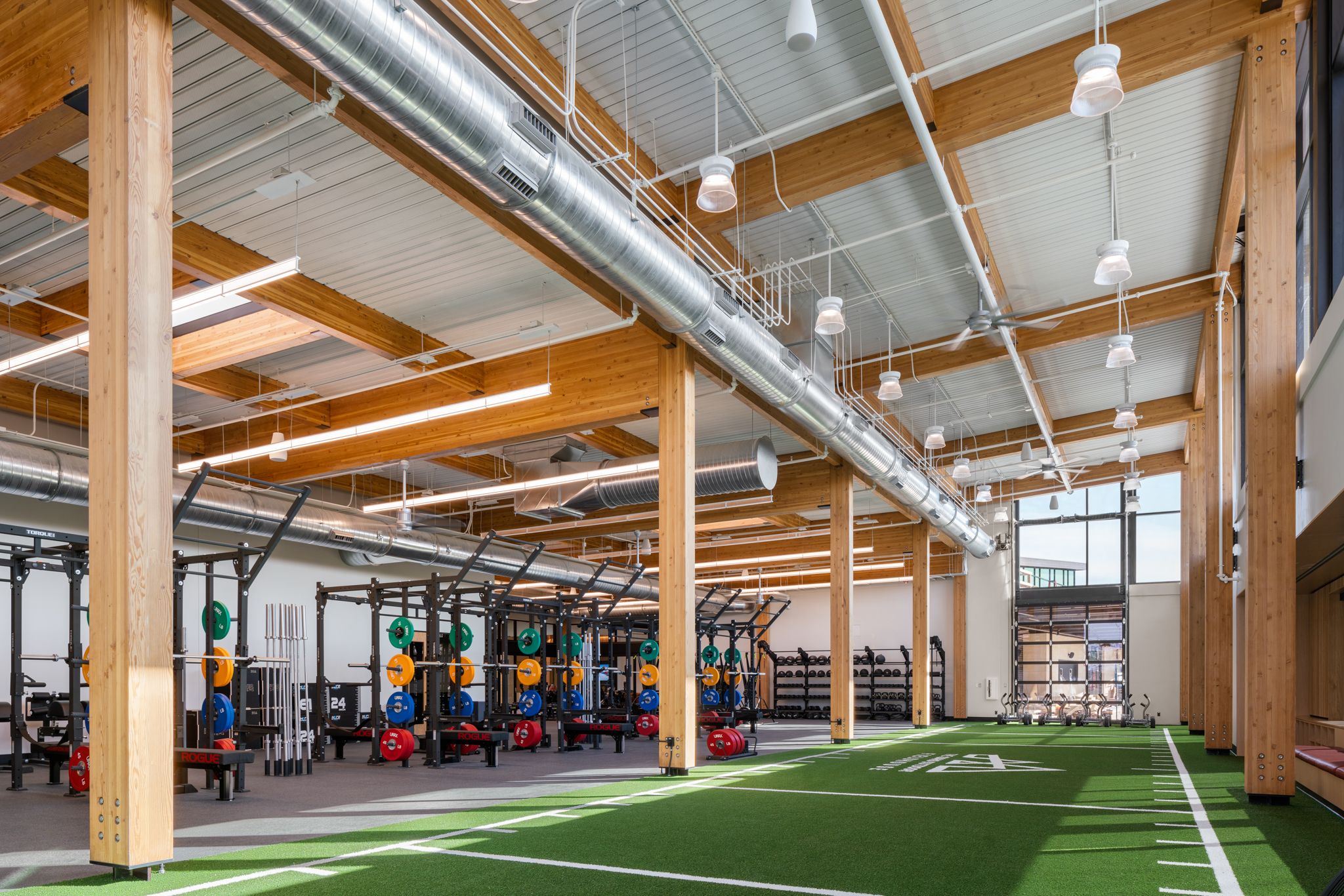 Summit Hyperbarics and Wellness building on the Idaho Outdoor Fieldhouse campus at dusk.