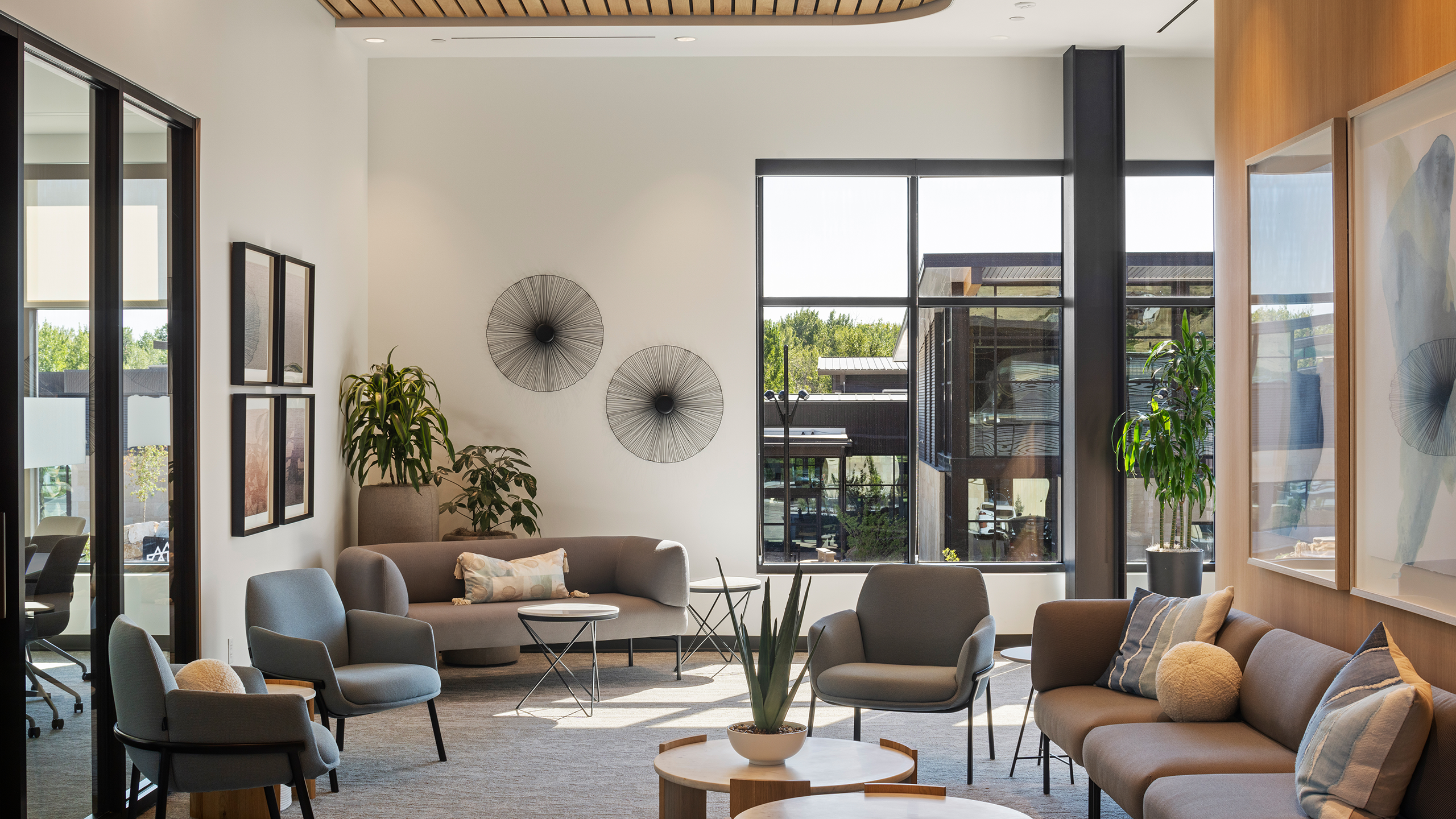 Modern lobby at Summit Hyperbarics & Wellness with comfortable seating, warm lighting, and welcoming reception area.